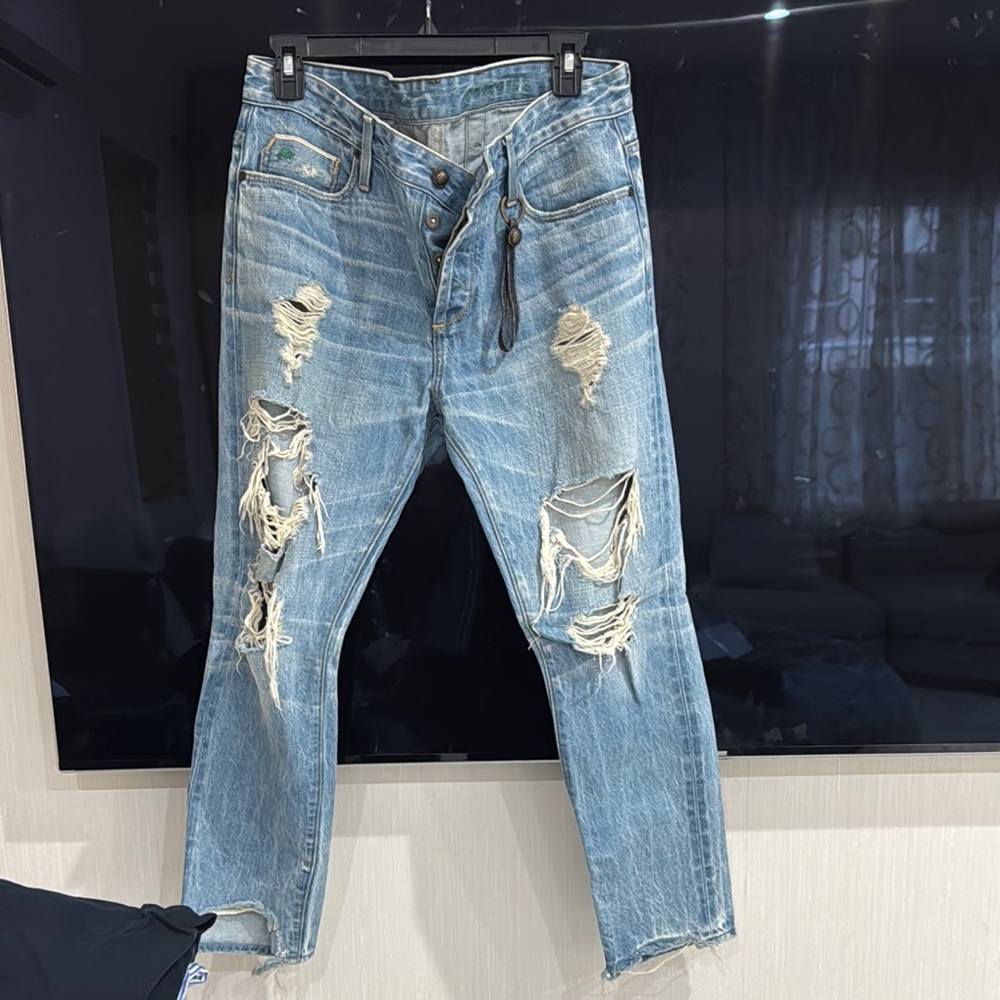 Blue Skinny Jeans with Distressed Detailing